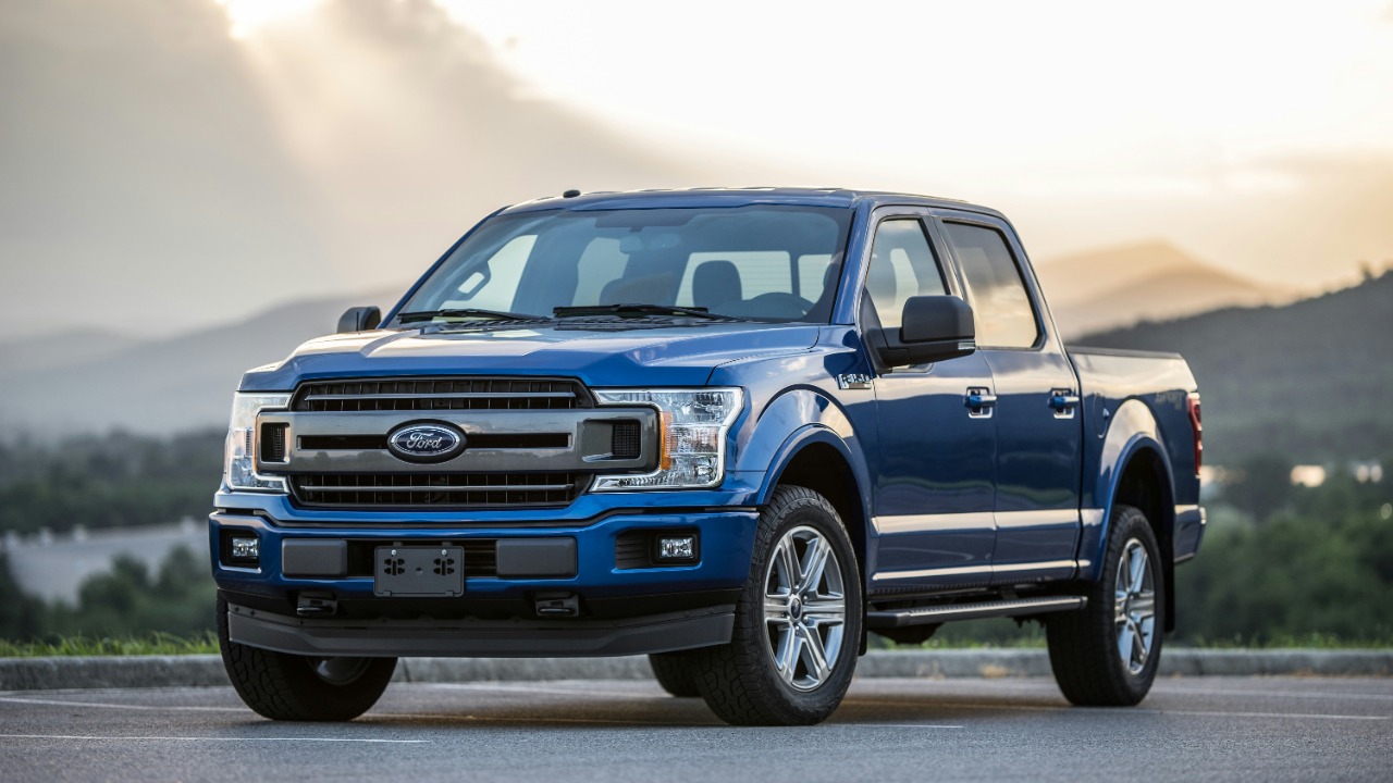 Image Credit: blue Ford pickup truck — Caleb White