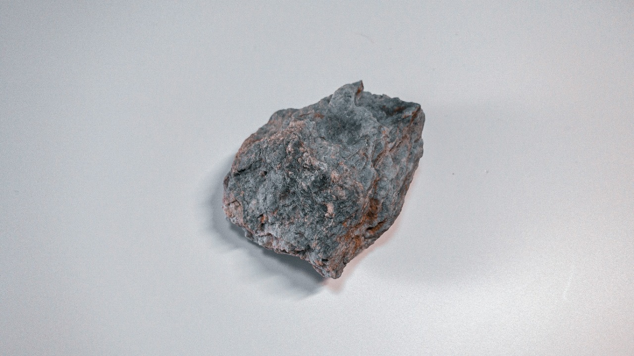 brown and black stone on white surface — Anton Maksimov 5642.su