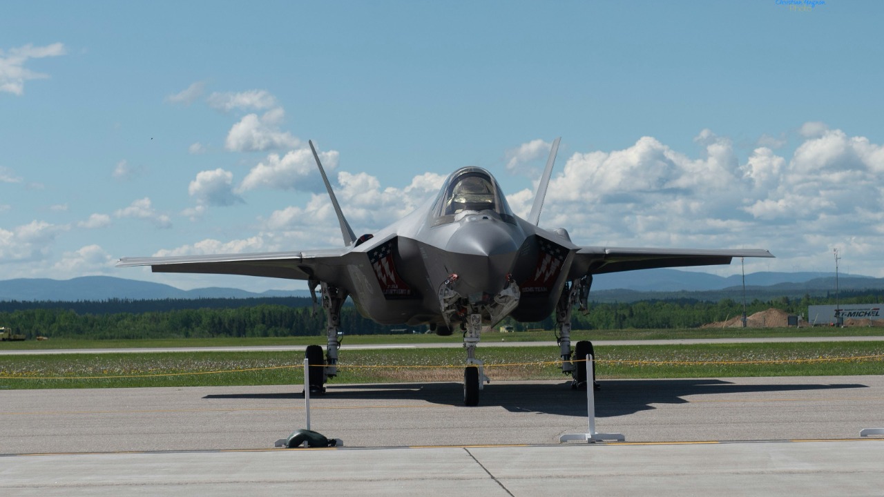 Image Credit: a fighter jet sitting on top of an airport tarmac — Christian Gagnon