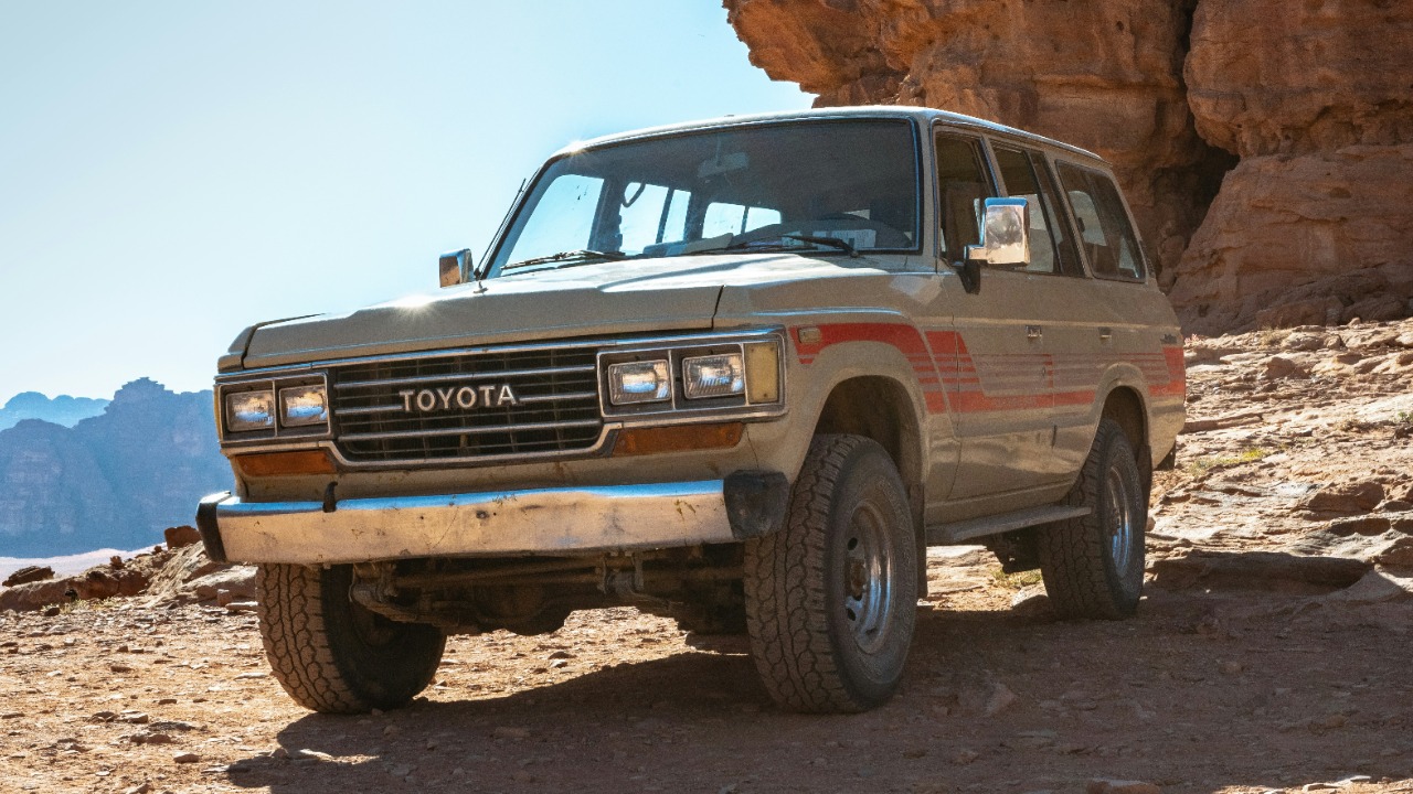 Image Credit: silver Toyota Land Cruiser parked on ground during daytime — Nikolas Noonan