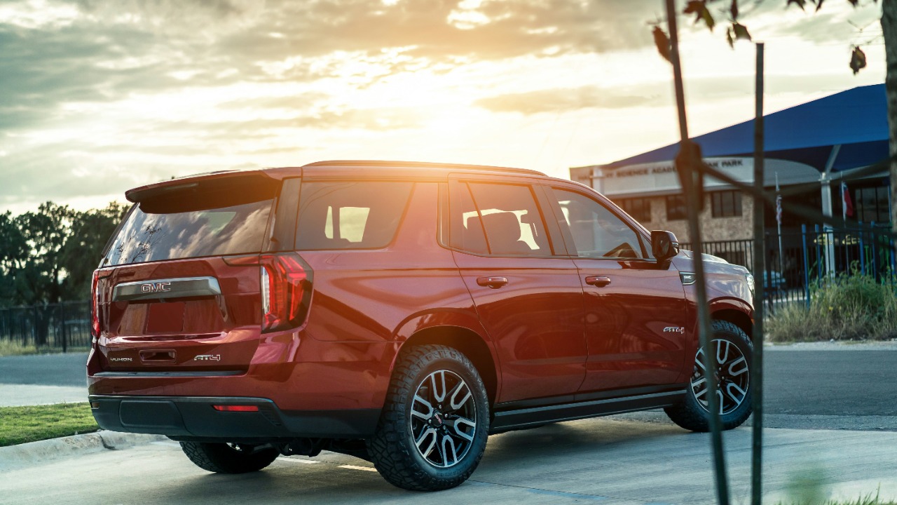 Image Credit: red suv on snow covered ground during daytime — Richard Guillory