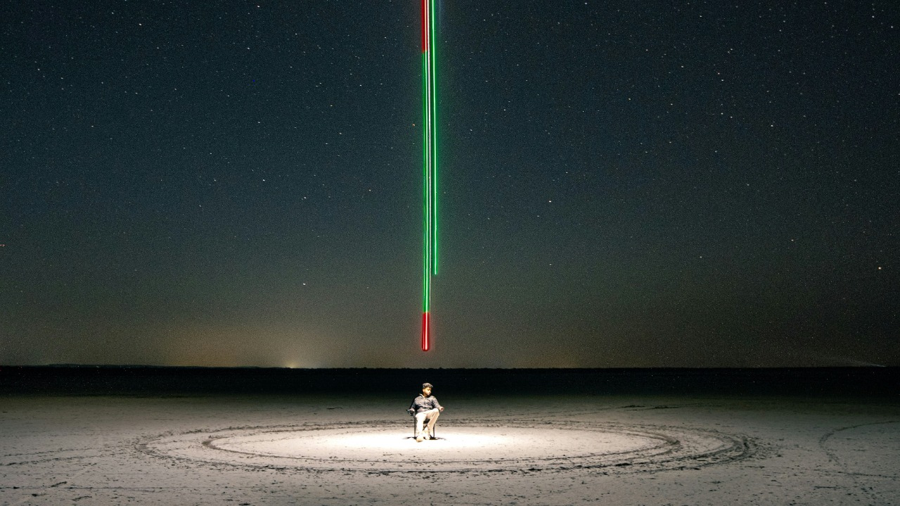 Image Credit: a person standing in the middle of a field under a star filled sky — sayan Nath
