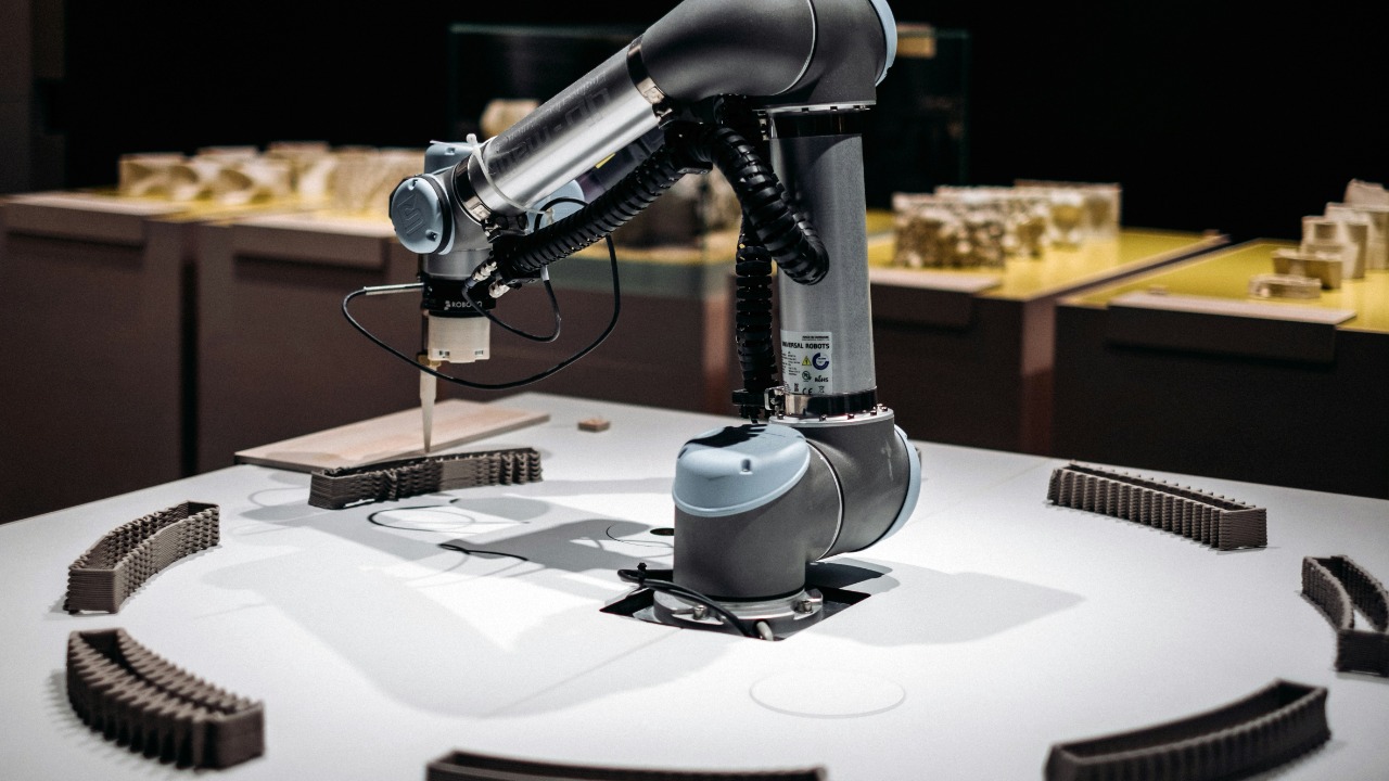 a robot that is sitting on a table — Maria Teneva