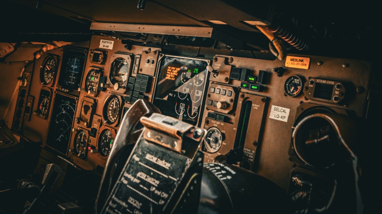 Image Credit: the cockpit of an airplane with many controls — Joao