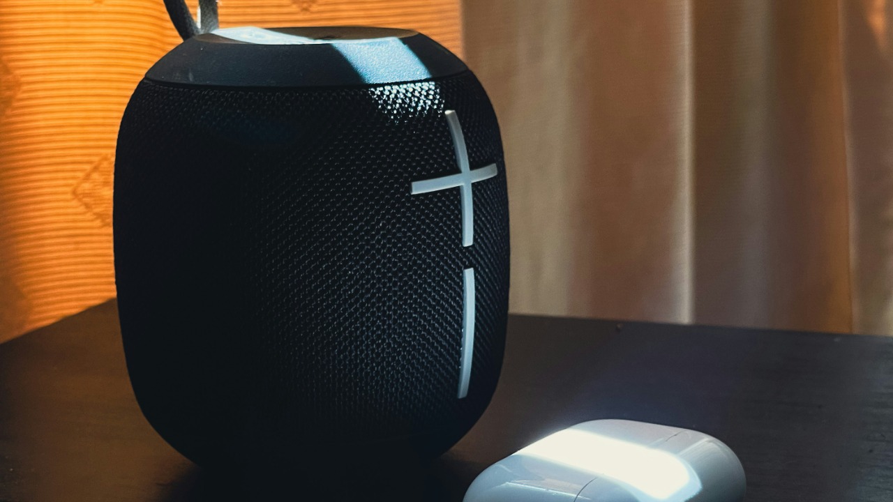 Image Credit: a black speaker and a white mouse on a table — Paul Moville