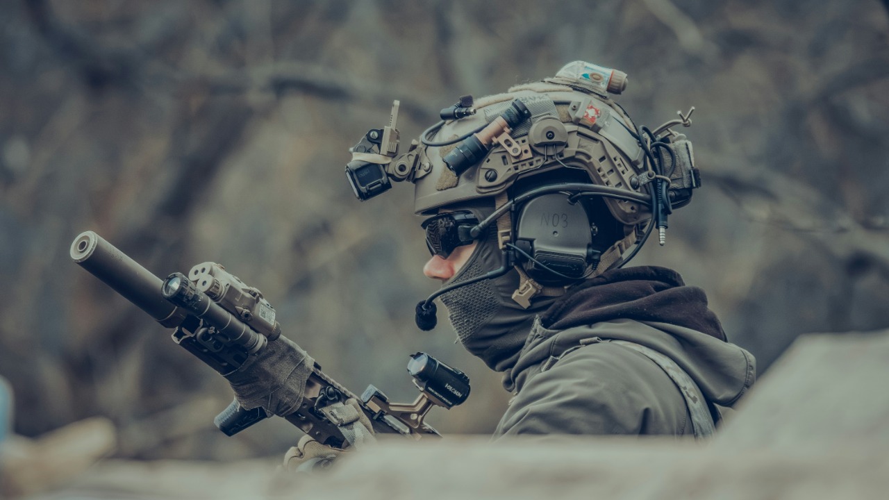 Image Credit: A man with a gun in his hand — Vladimír Mišík