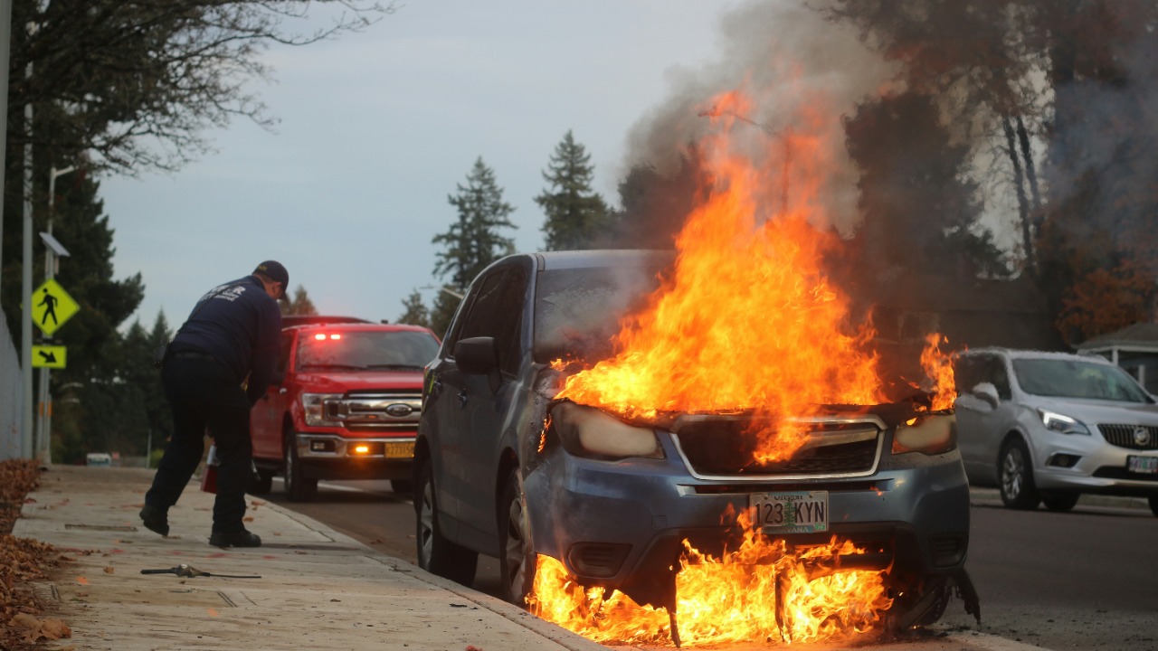 Image Credit: man in black jacket standing near fire — Riley Edwards