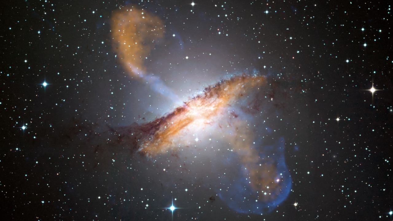 Image Credit: ESO/WFI (Optical); MPIfR/ESO/APEX/A.Weiss et al. (Submillimetre); NASA/CXC/CfA/R.Kraft et al. (X-ray)
Derivative work including grading and crop: Julian Herzog - CC BY 4.0/Wiki Commons