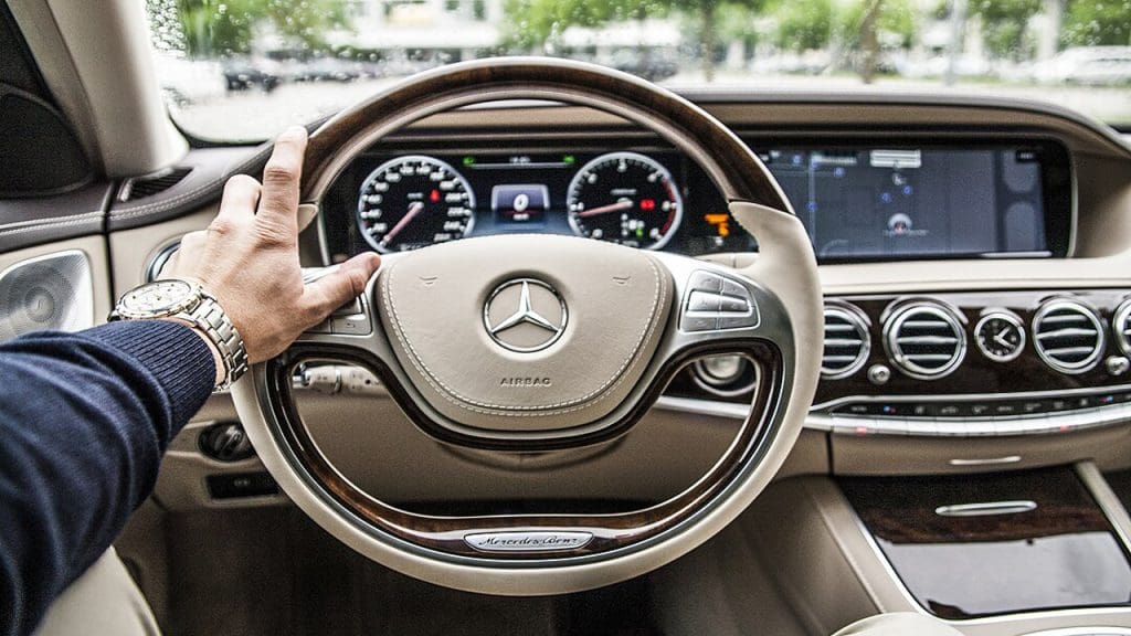1280px-Driving_a_Mercedes_(Unsplash)