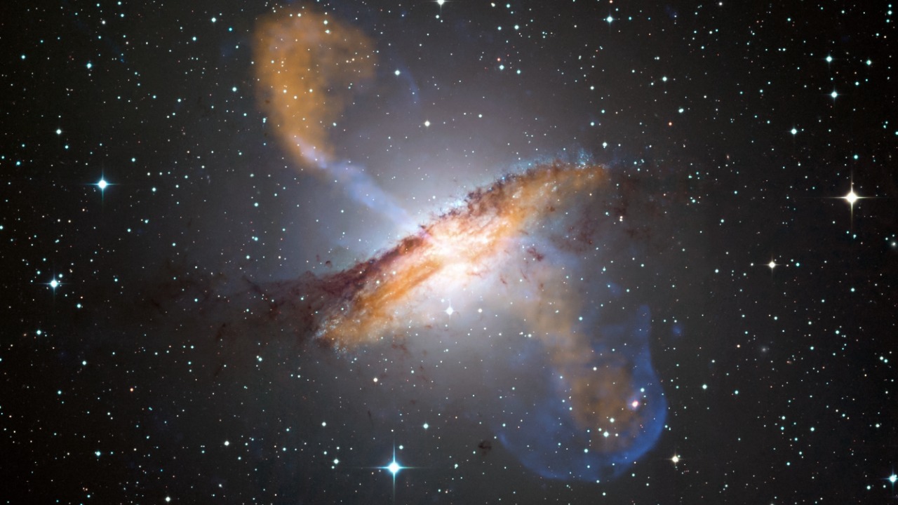 Image Credit: ESO/WFI (Optical); MPIfR/ESO/APEX/A.Weiss et al. (Submillimetre); NASA/CXC/CfA/R.Kraft et al. (X-ray) Derivative work including grading and crop: Julian Herzog - CC BY 4.0/Wiki Commons
