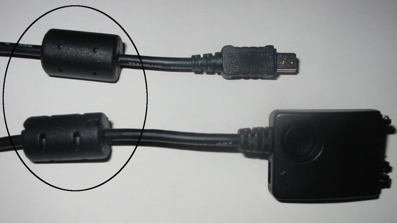 That black cylinder on your cables actually does something