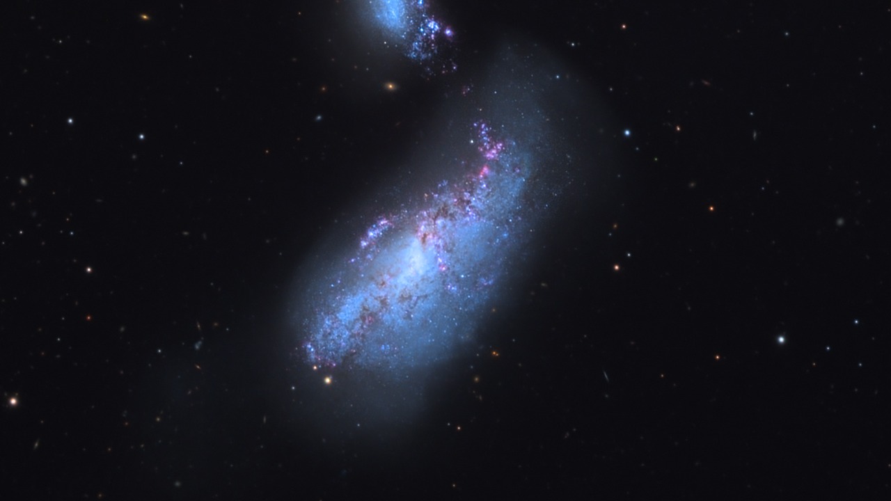 JWST spots 2 cosmic dwarves locked in a gravity dance