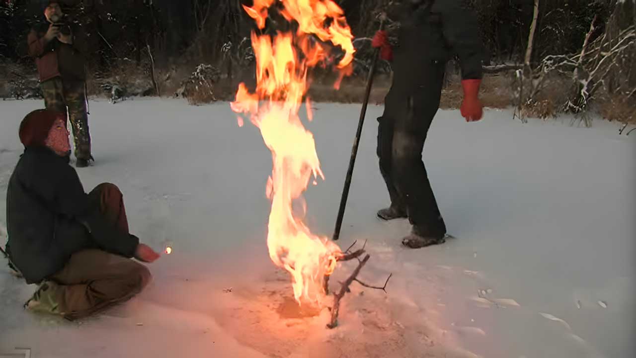 Methane-choked lake ignites, setting the air above it on fire