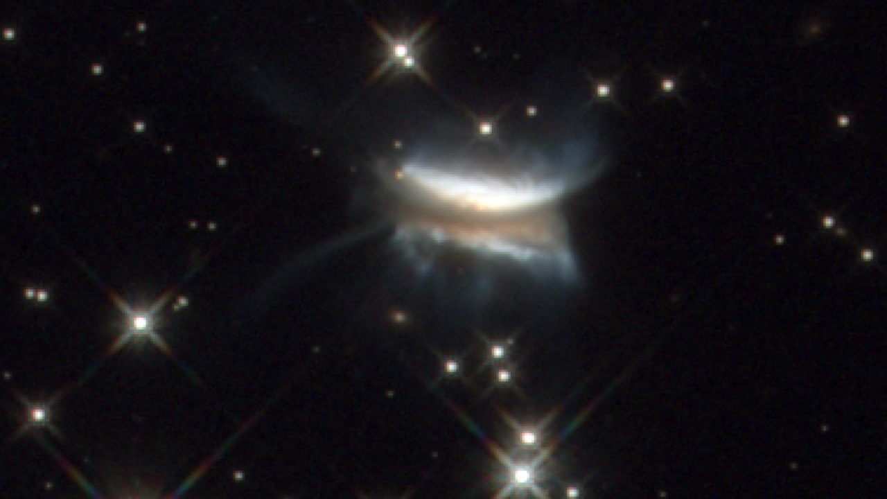 Hubble spots extreme chaos inside the “Dracula’s Sandwich” system