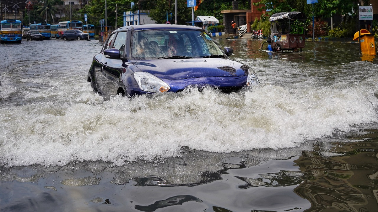 Flooded Street Crossing — Image Credit: Dibakar Roy/Pexels