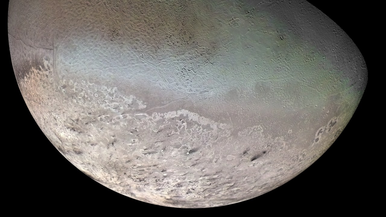 Triton — Image Credit: NASA / Jet Propulsion Lab / U.S. Geological Survey - Public domain/Wiki Commons
