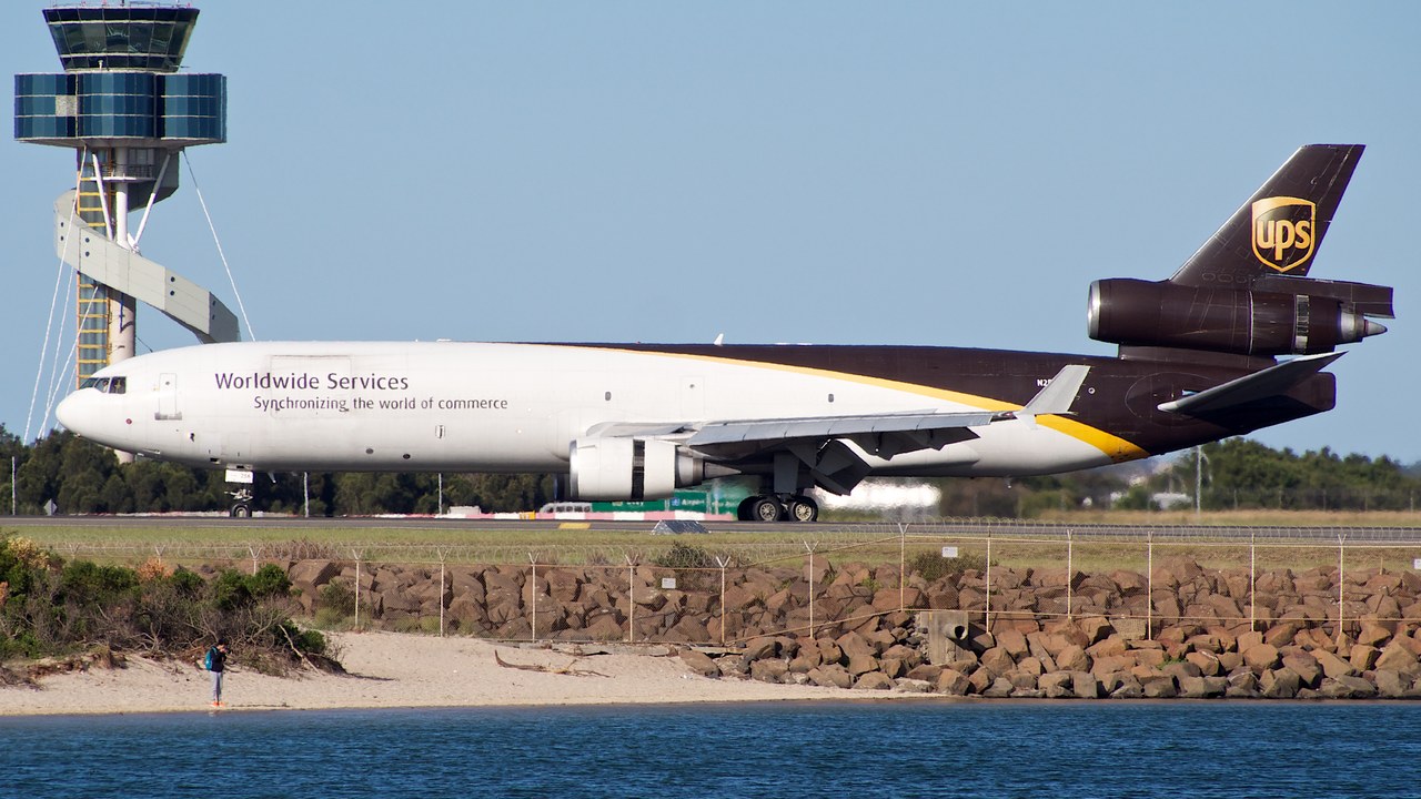 Fake UPS package-on-hold text — Image Credit: Edwin Leong - CC BY-SA 2.0/Wiki Commons